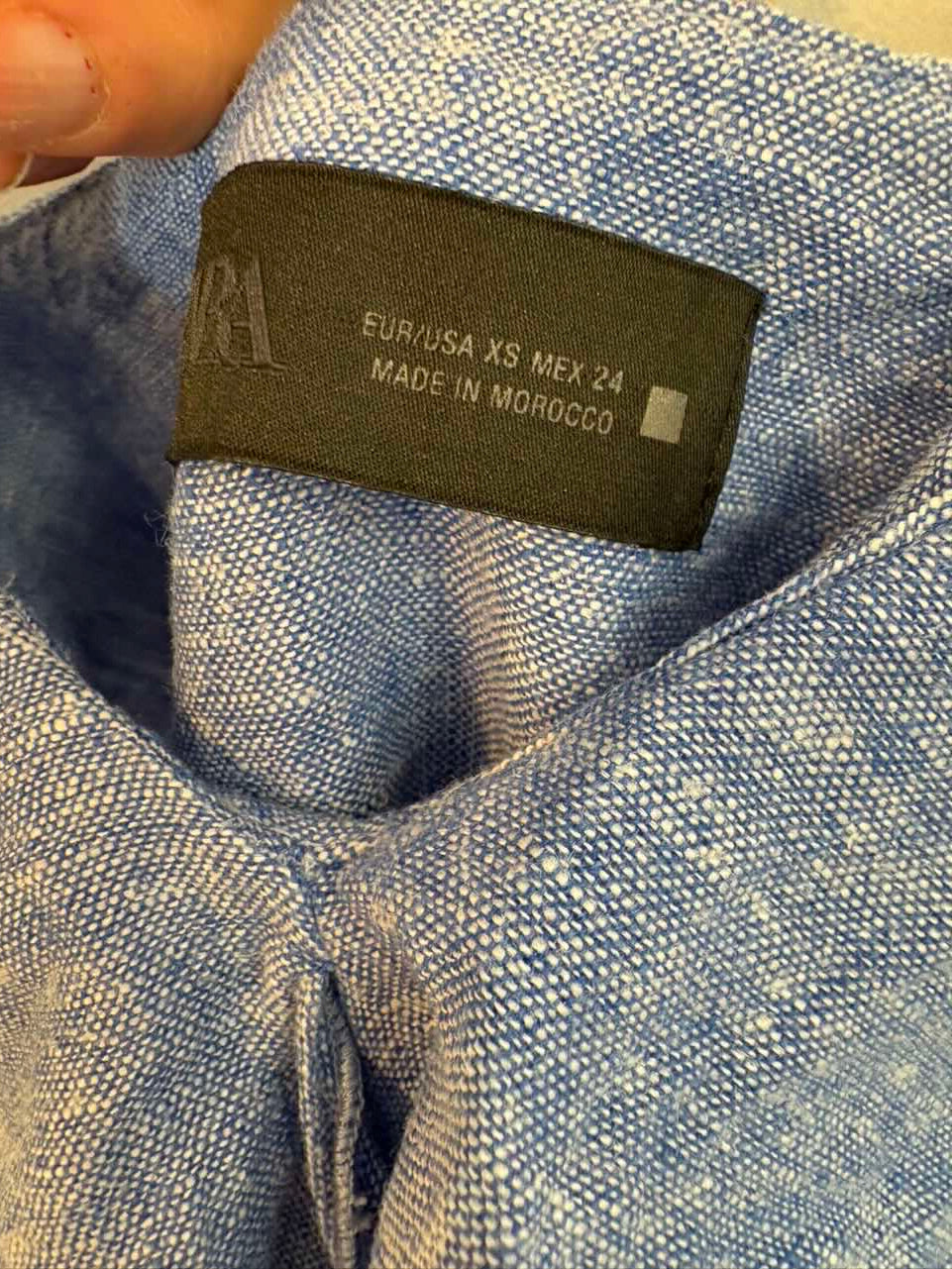 ZARA. Top azul jaspeado con lino