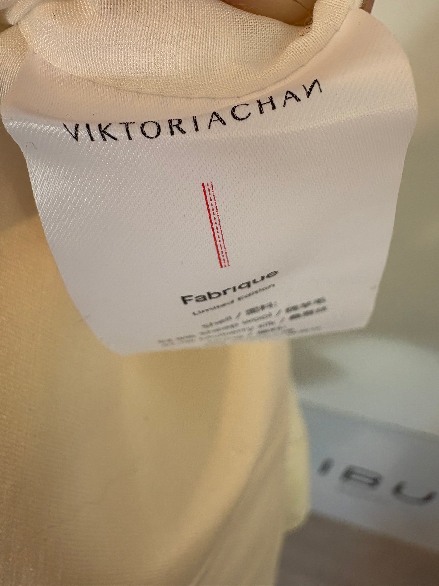 FABRIQUE by VIKTORIA CHAN. Asymmetrical ecru silk top. Size 2 (M)