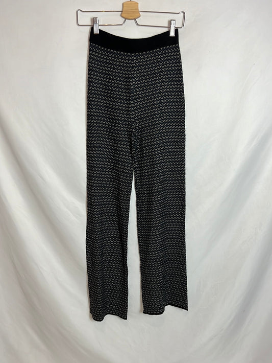 SFERA. Pantalón negro punto semitransparente. T S