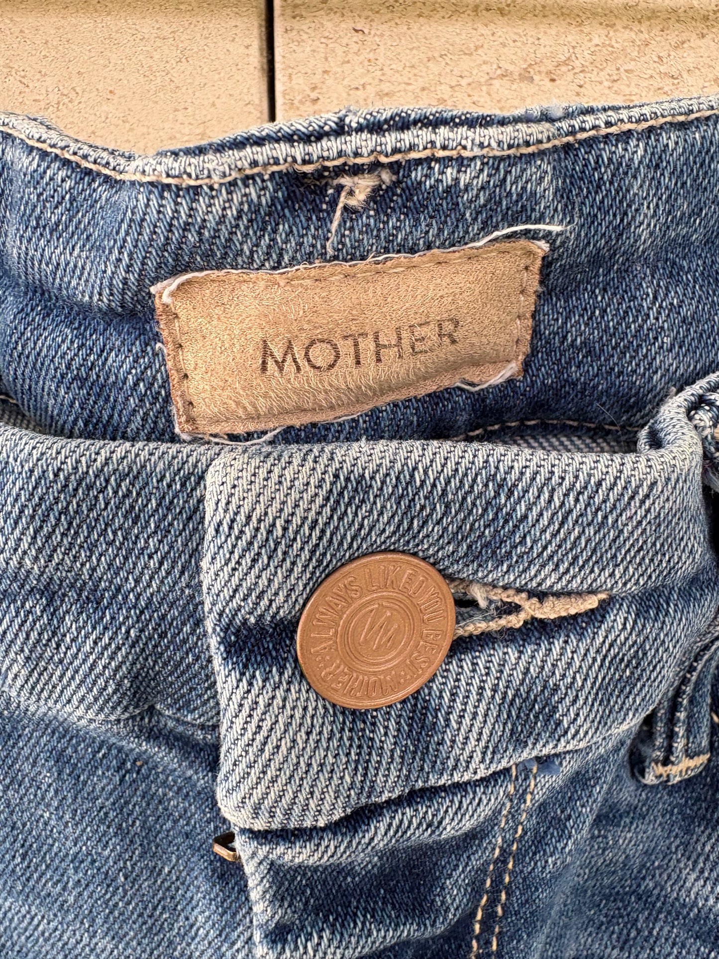 MOTHER. Denim ligeramente acampanado