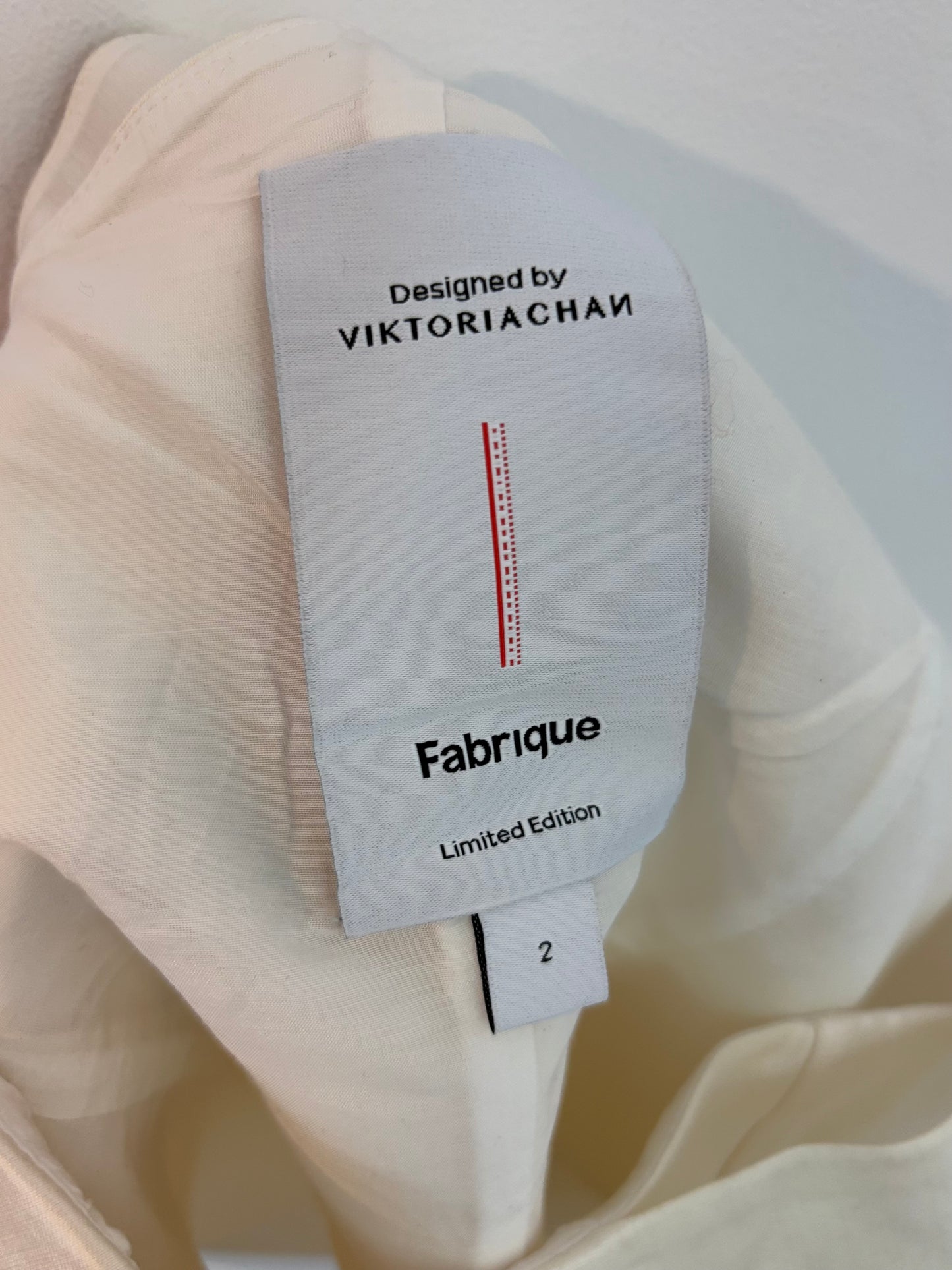 FABRIQUE by VIKTORIA CHAN. Asymmetrical ecru silk top. Size 2 (M)