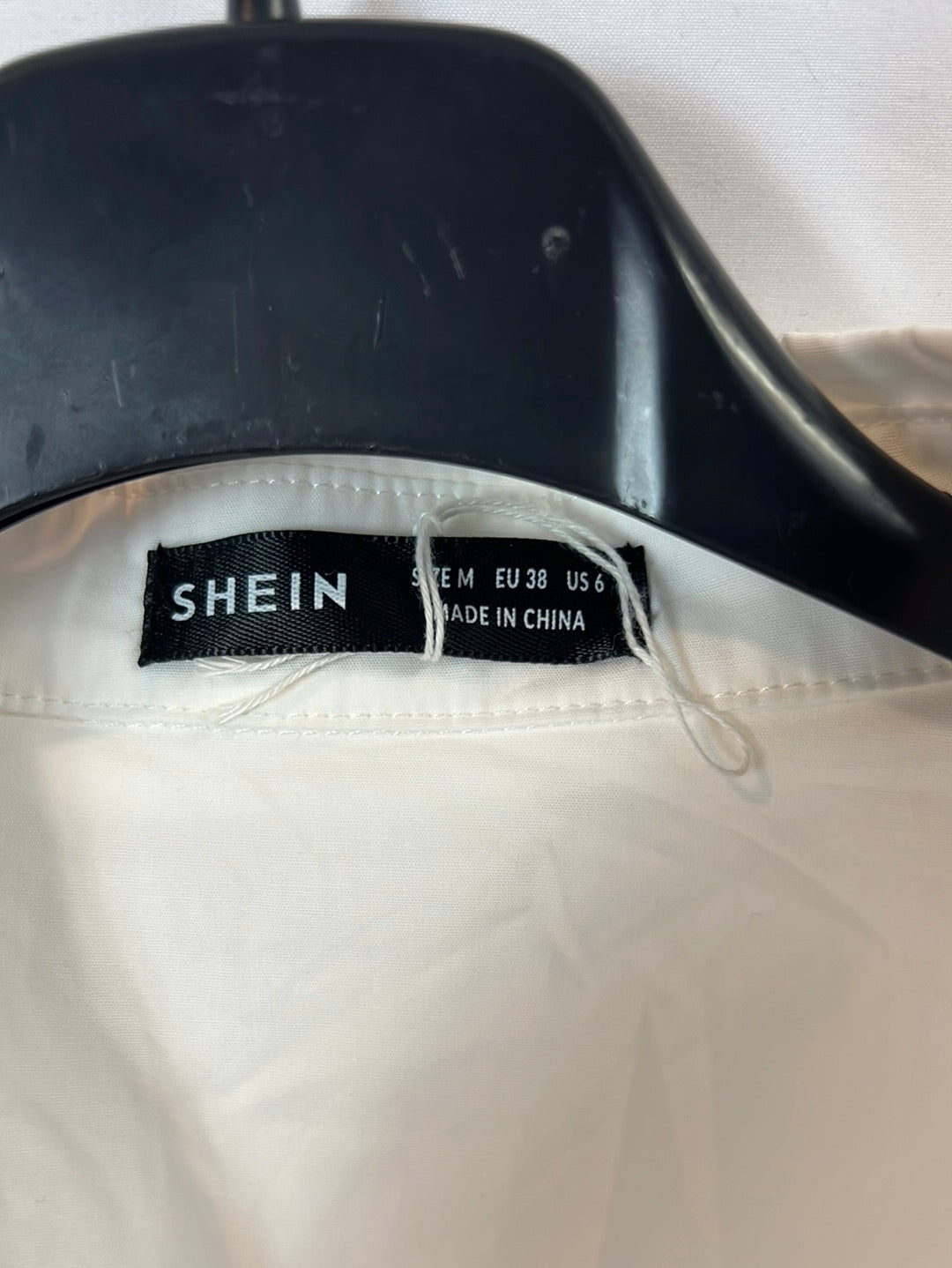 SHEIN. White cropped Tm shirt
