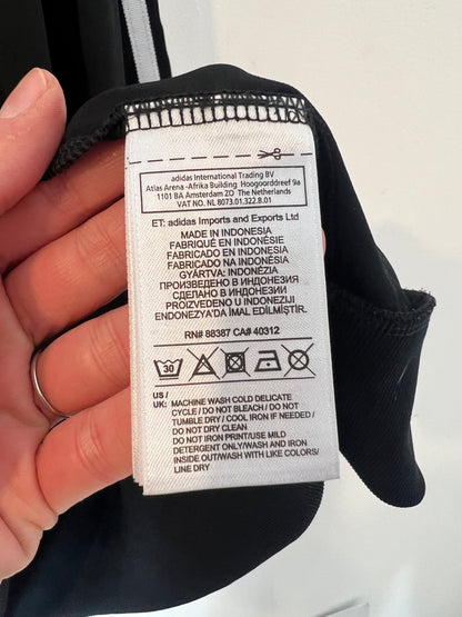 ADIDAS. Sudadera negra fluida. T M