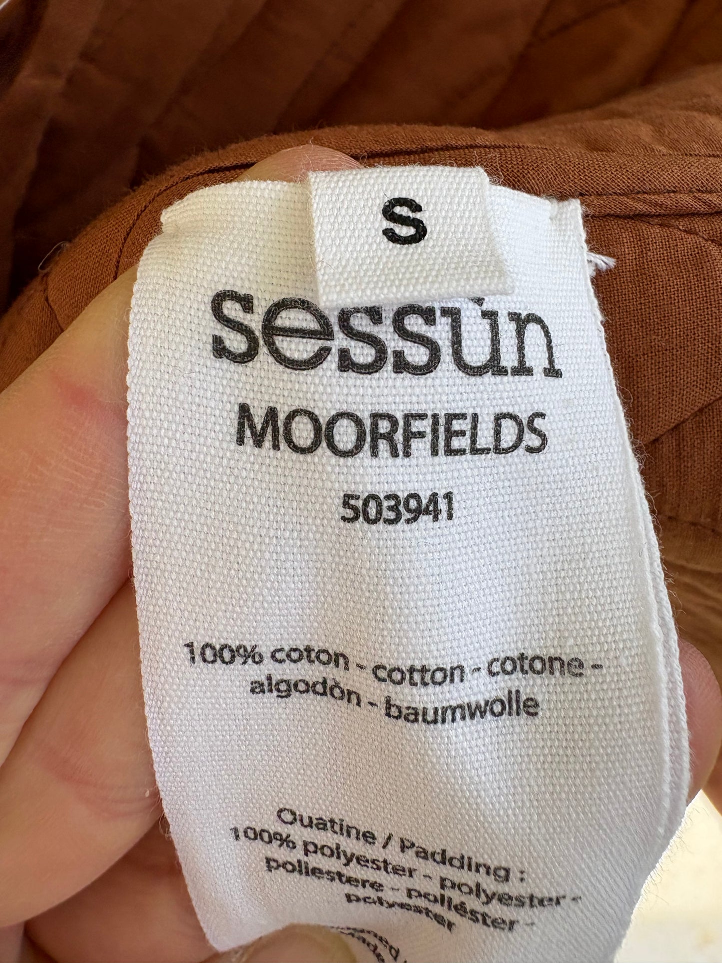 SESSÚN. Chaleco acolchado reversible