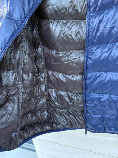 UNIQLO. Ultralight blue down jacket with hood. TM