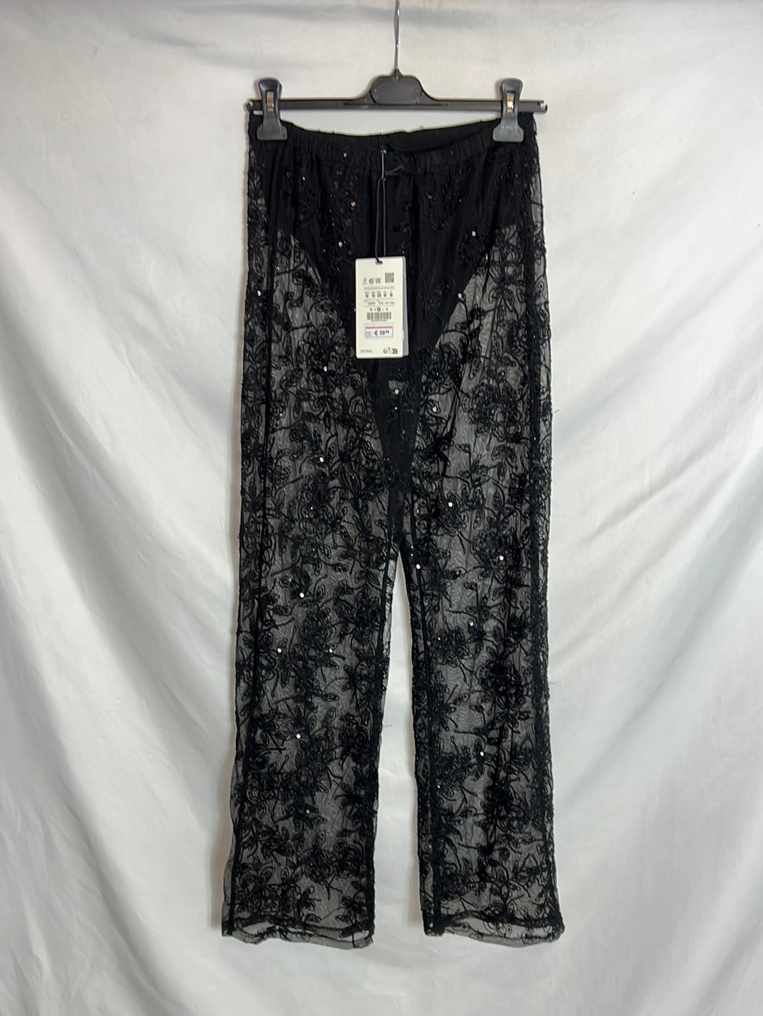 PULL&BEAR . Pantalón negro transparente encaje. T M