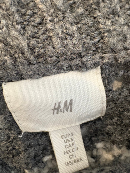 H&M. Jersey gris greca