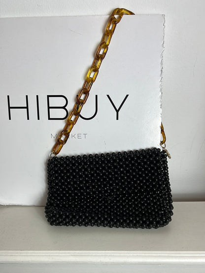 UTERQÜE. Bolso negro bolas