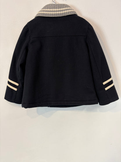 NANOS. Abrigo azul con lana