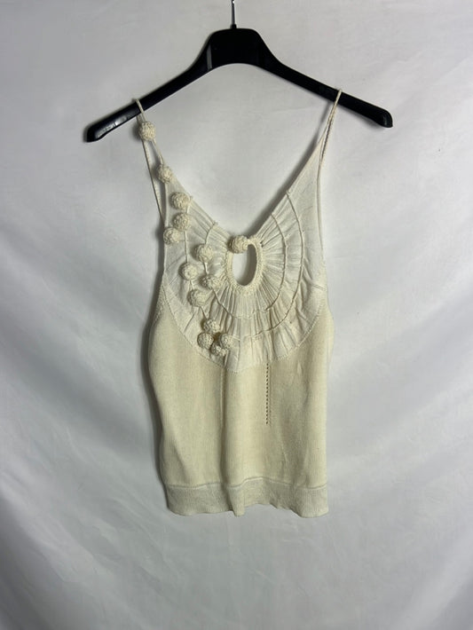 NOON. Top punto beige borlas. T S