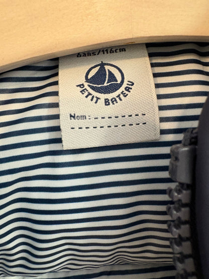 PETIT BATEAU. Chaleco azul acolchado. T 6 años