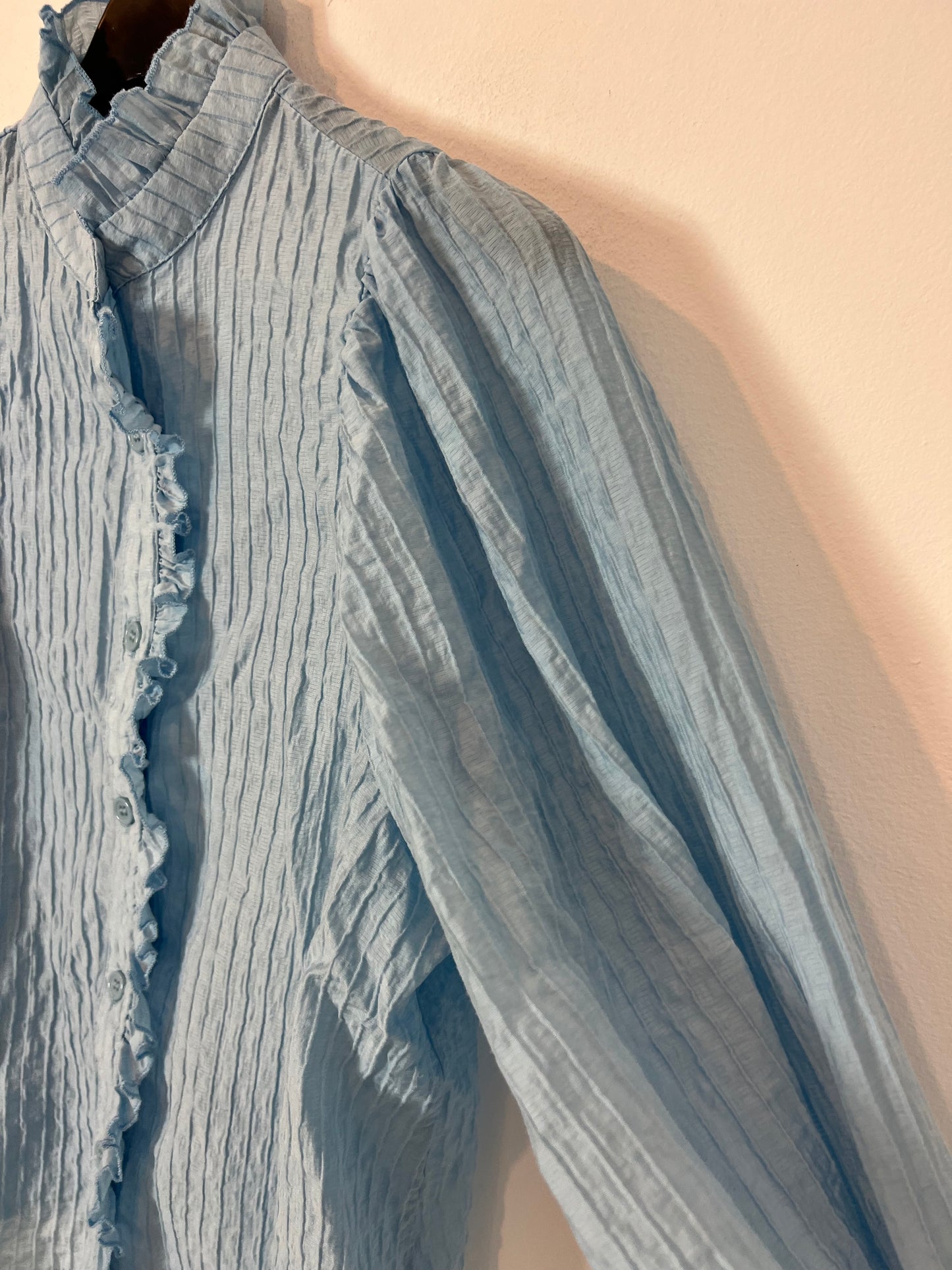 OTHERS. Blue blouse with ruffles Your(S)