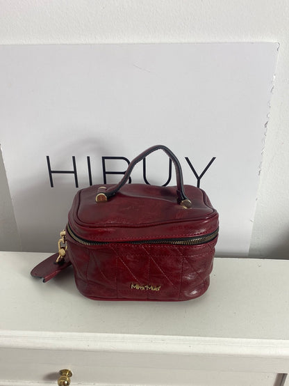 MIMI MUA. Burgundy bag