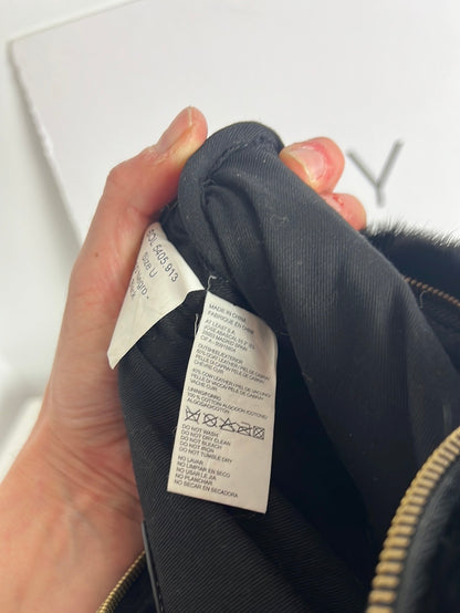 INTROPIA. Bolso de mano piel doble textura