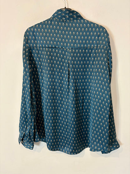 NOON. Blusa  satinada azul estampada
