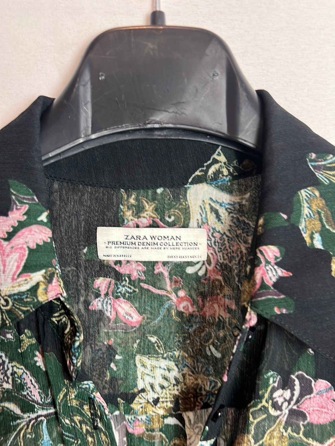 ZARA. Over a long, semi-sheer floral shirt. XS