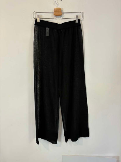 ZARA. Pantalón negro fluido semi transparente