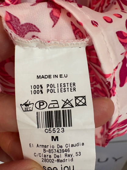 SEE IOU Juan Avellaneda. Vestido corto cruzado estampado rosa