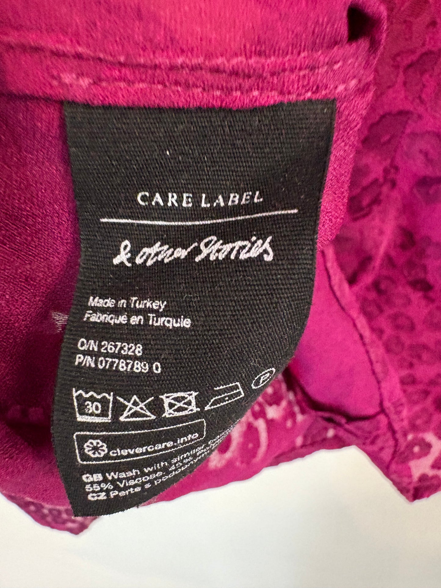 &amp; OTHER STORIES. Textured puff-sleeve blouse. Size 36