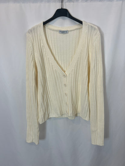 STRADIVARIUS. Cárdigan canalé color crudo. T L