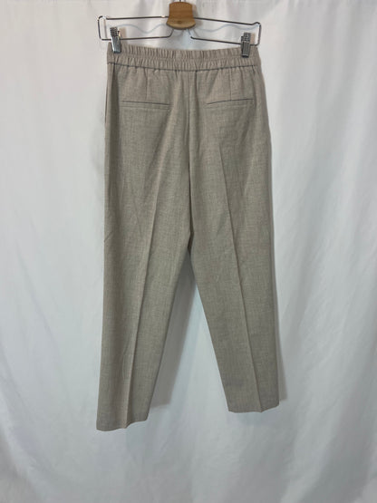 MANGO. Pantalón beige jaspeado abotonado. T S
