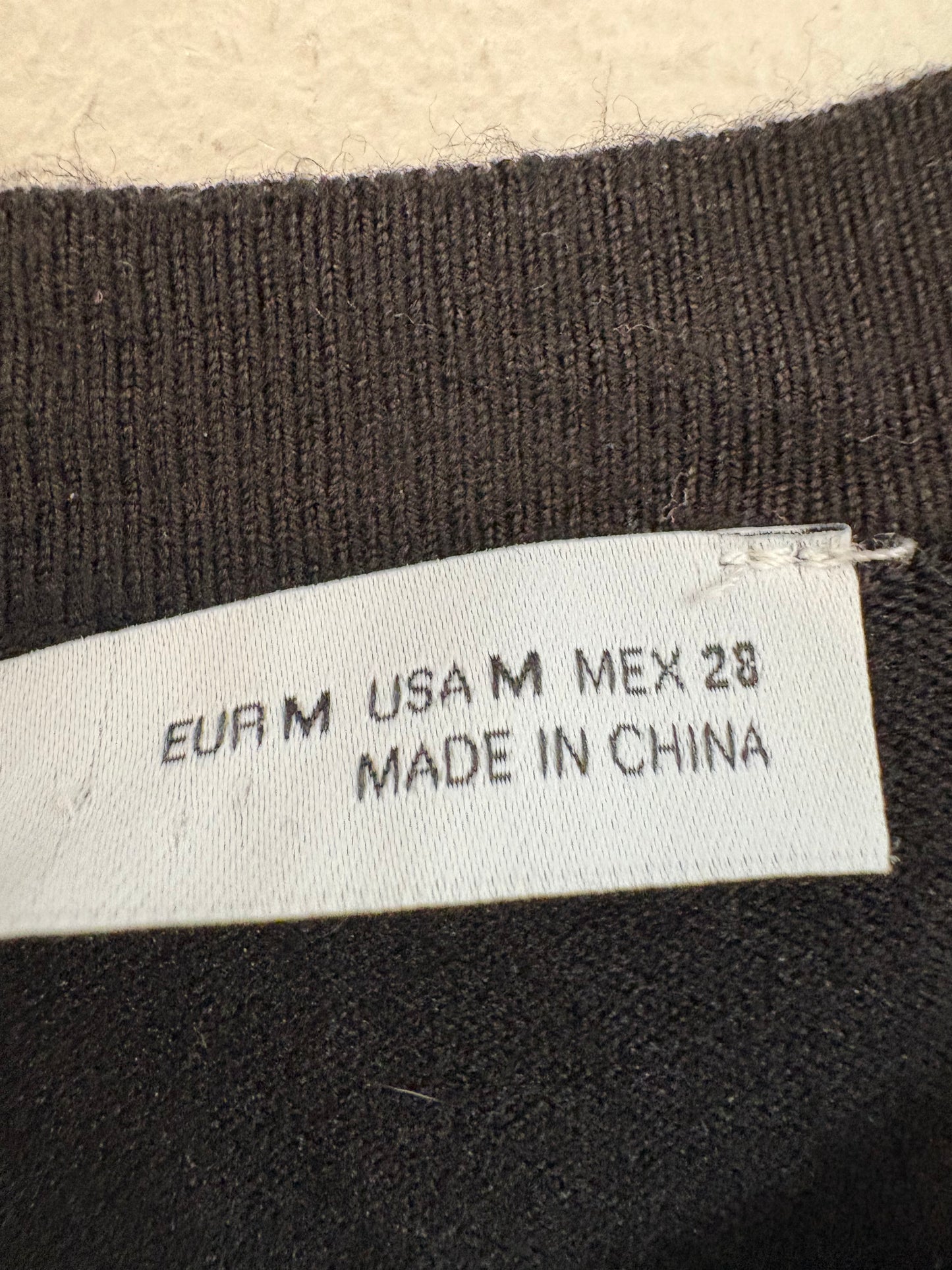 ZARA. Black stretch knit top. TM