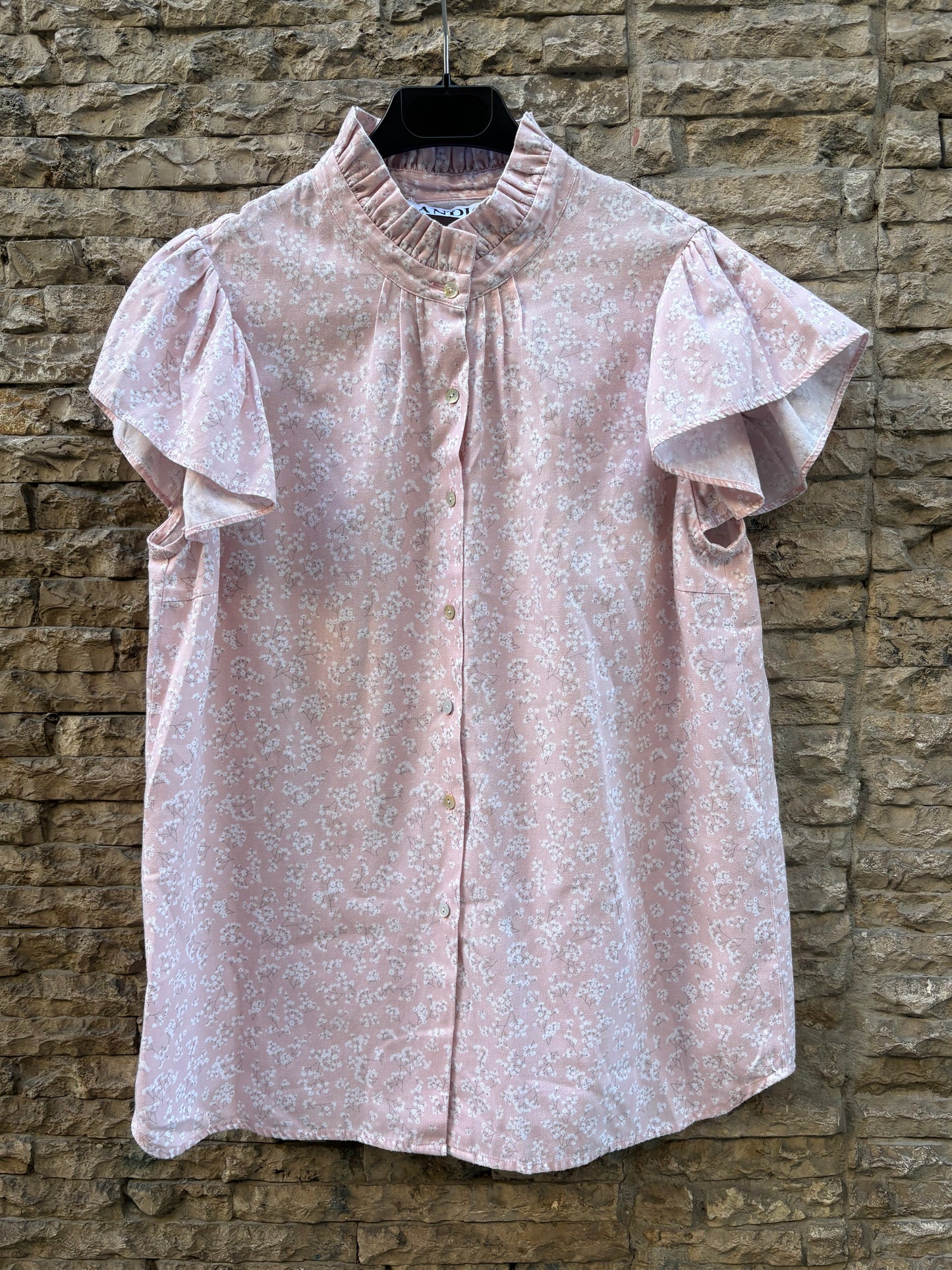 ANDION. Blusa tono pastel flores