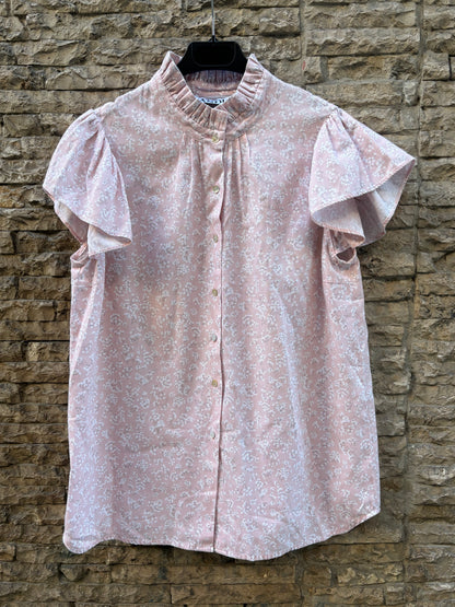 ANDION. Blusa tono pastel flores
