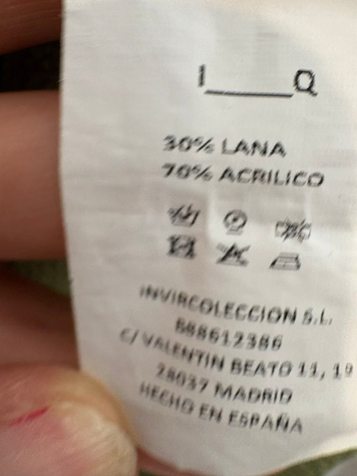 IQ. Jersey verde dibujo con lana