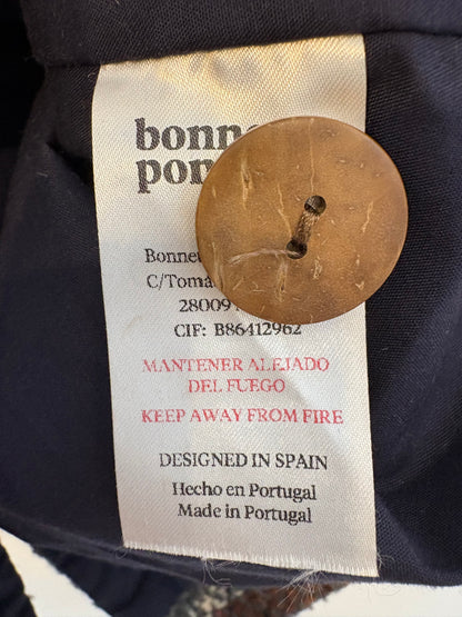 BONNET A POMPÓN . Abrigo cuadros con lana