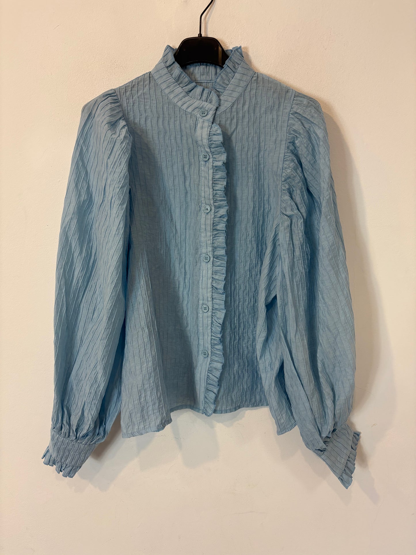 Blusa azul claro textura