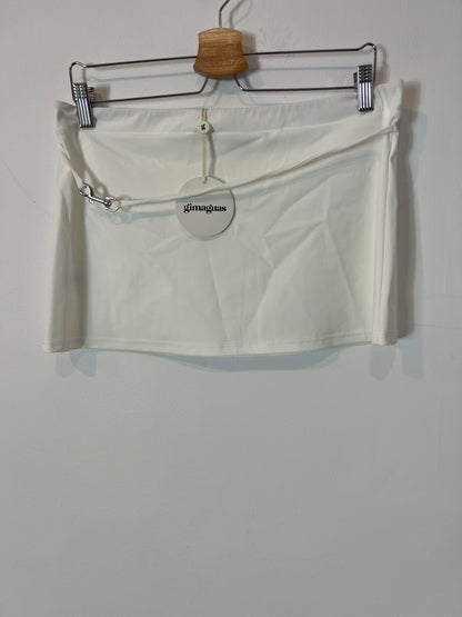 GIMAGUAS. Falda blanca corta semi elástica. T L