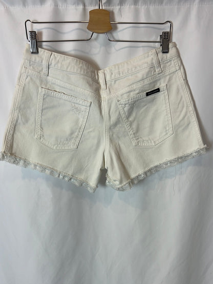 DOLCE&amp;GABBANA. White denim shorts with lace detail. Size 40