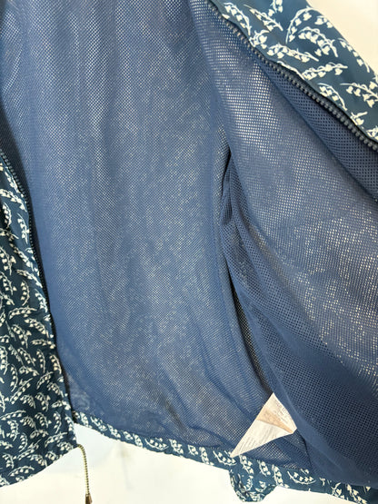 NICE THINGS .Chubasquero verde estampado