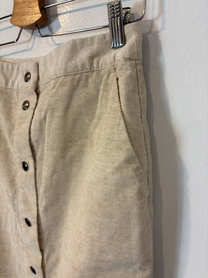 MASSCOB. Falda midi beige jaspeada