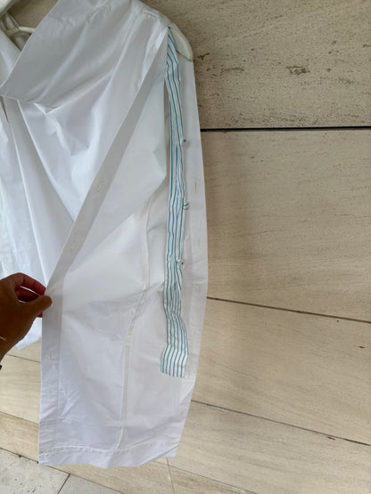 SILVIA TCHERASSI. Camisa blanca detalle mangas