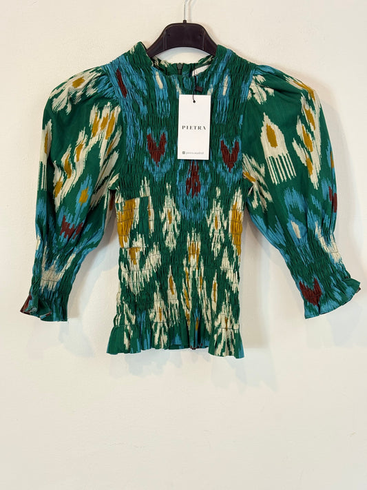 PIETRA. Blusa verde nido de abeja