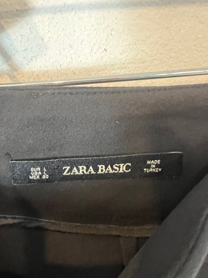 ZARA. Pantalón negro abalorios. T L