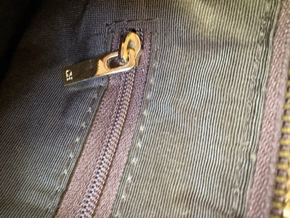 CAROLINA HERRERA. Bolso marrón piel asa regulable