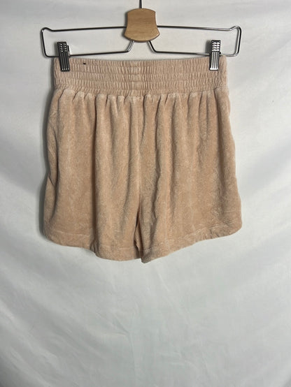 NIKE. Pantalón corto felpa. T S