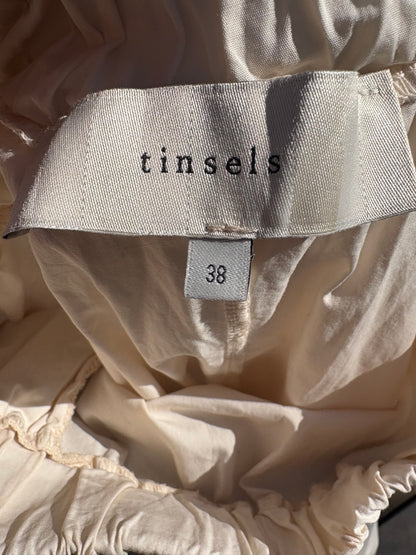 TINSELS. Falda midi en crudo bolsillos