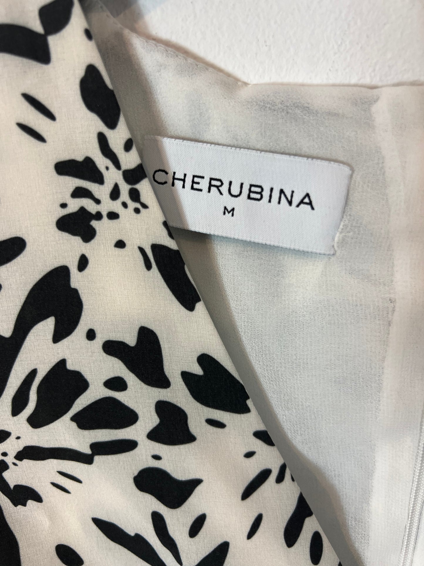 CHERUBINA. Long printed dress with gathered trim. TM