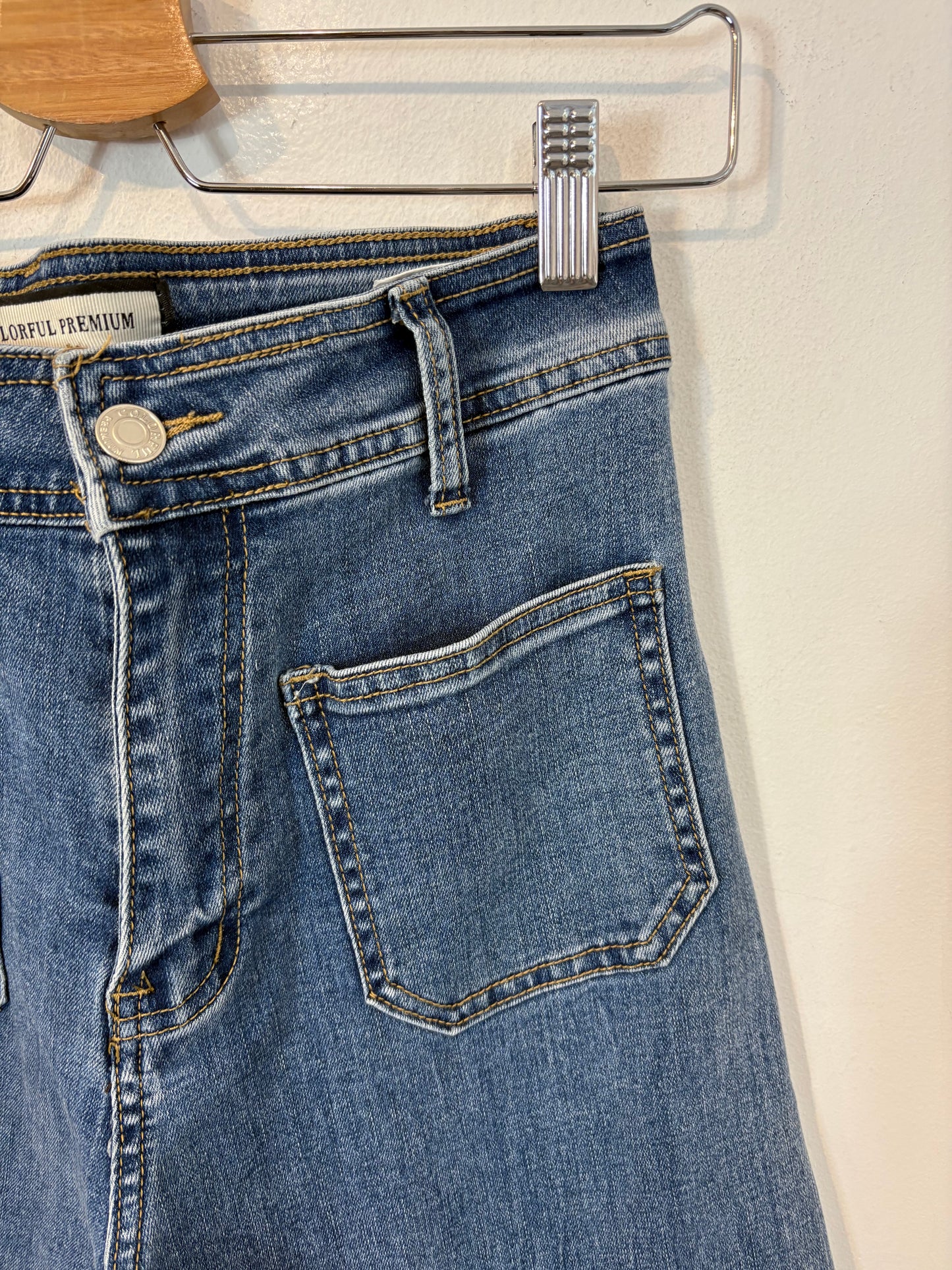 OTRAS. Denim cropped bolsillos