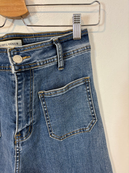 OTRAS. Denim cropped bolsillos