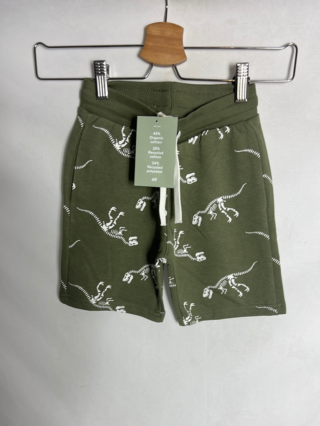 H&amp;M. Green dinosaur shorts. Size 5-6 years