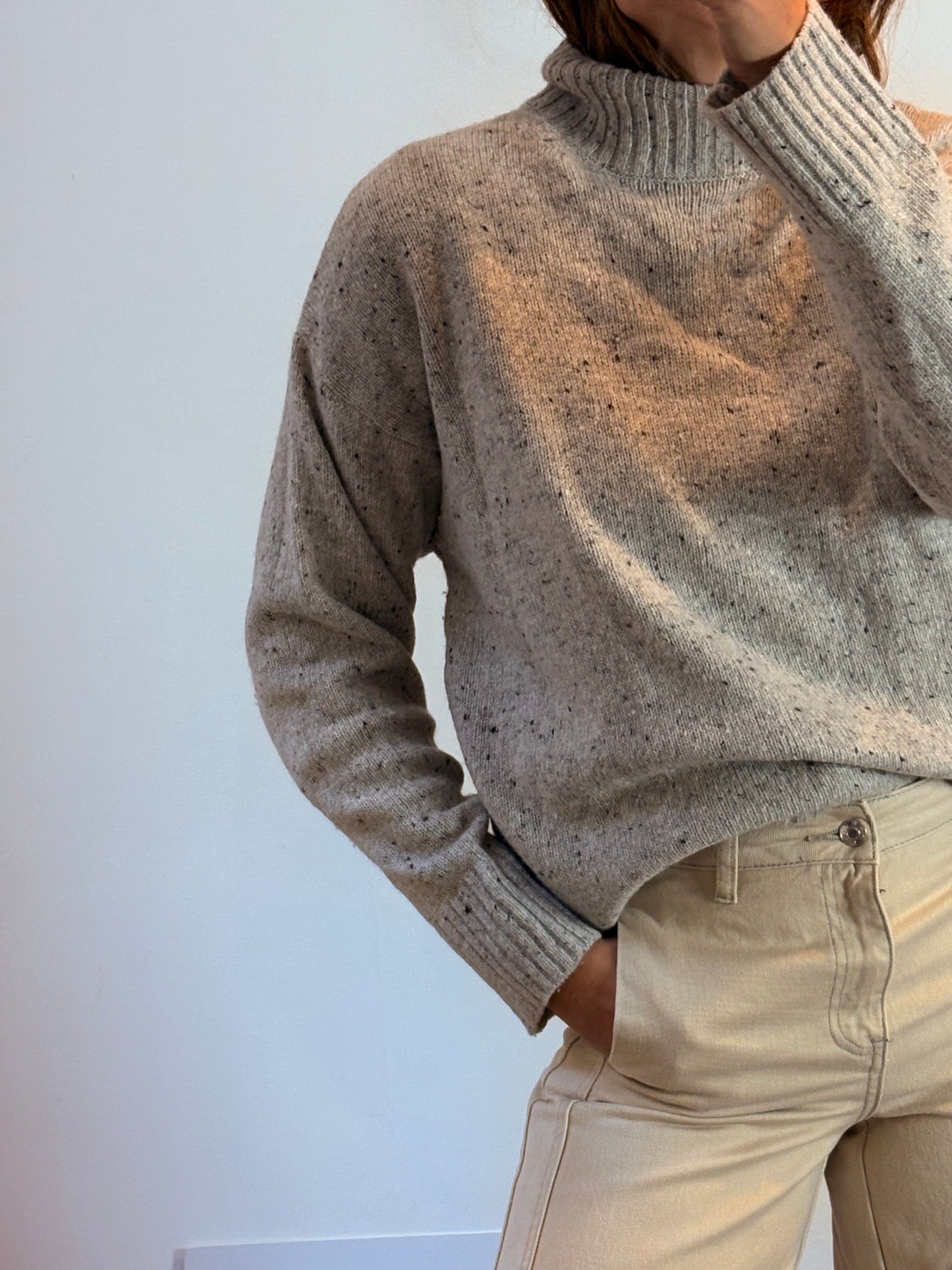 ZARA. Jersey gris cuello alto jaspeado