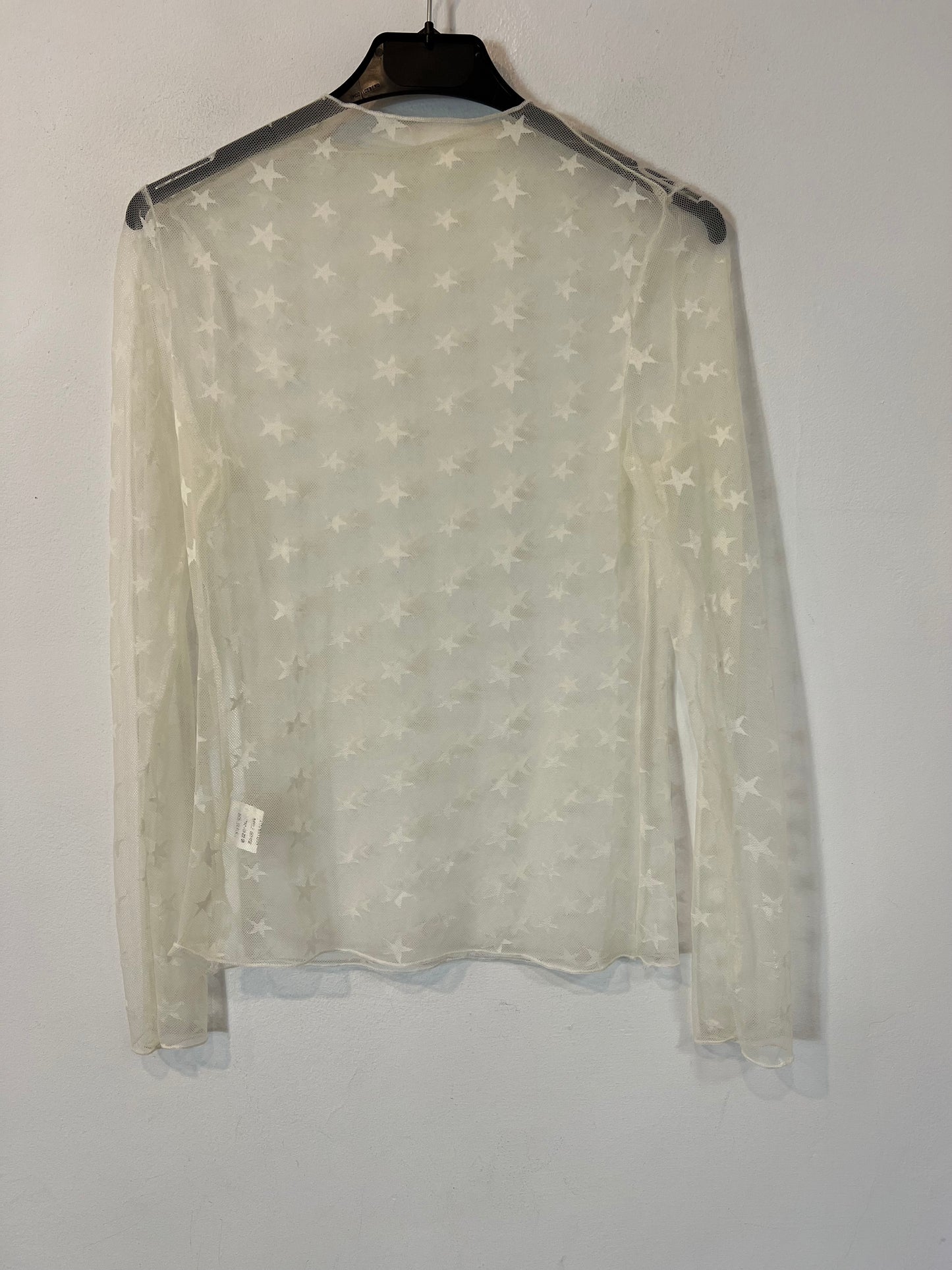 IN VOGUE.Top rejilla estrellas T.s