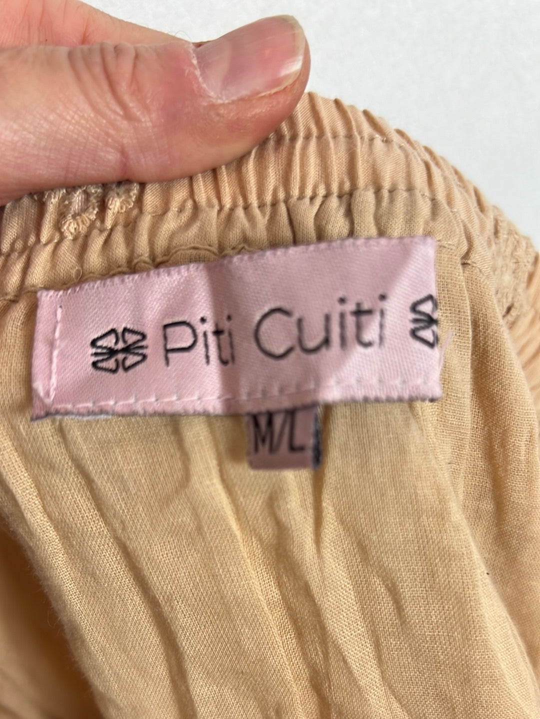 PITI CUITI. Total look rosa empolvado troquelado. T M/L