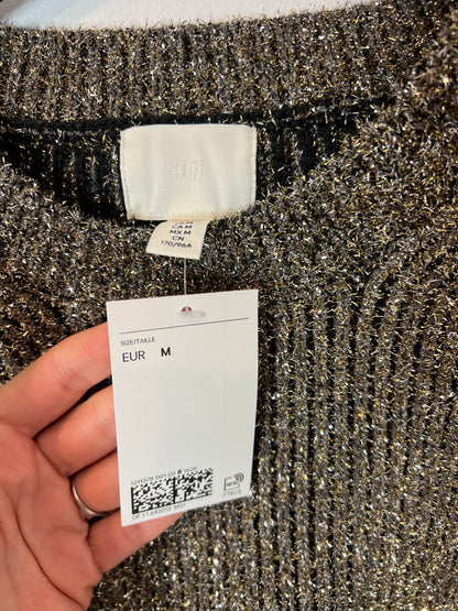 H&M. Jersey textura hilos brillo. T M