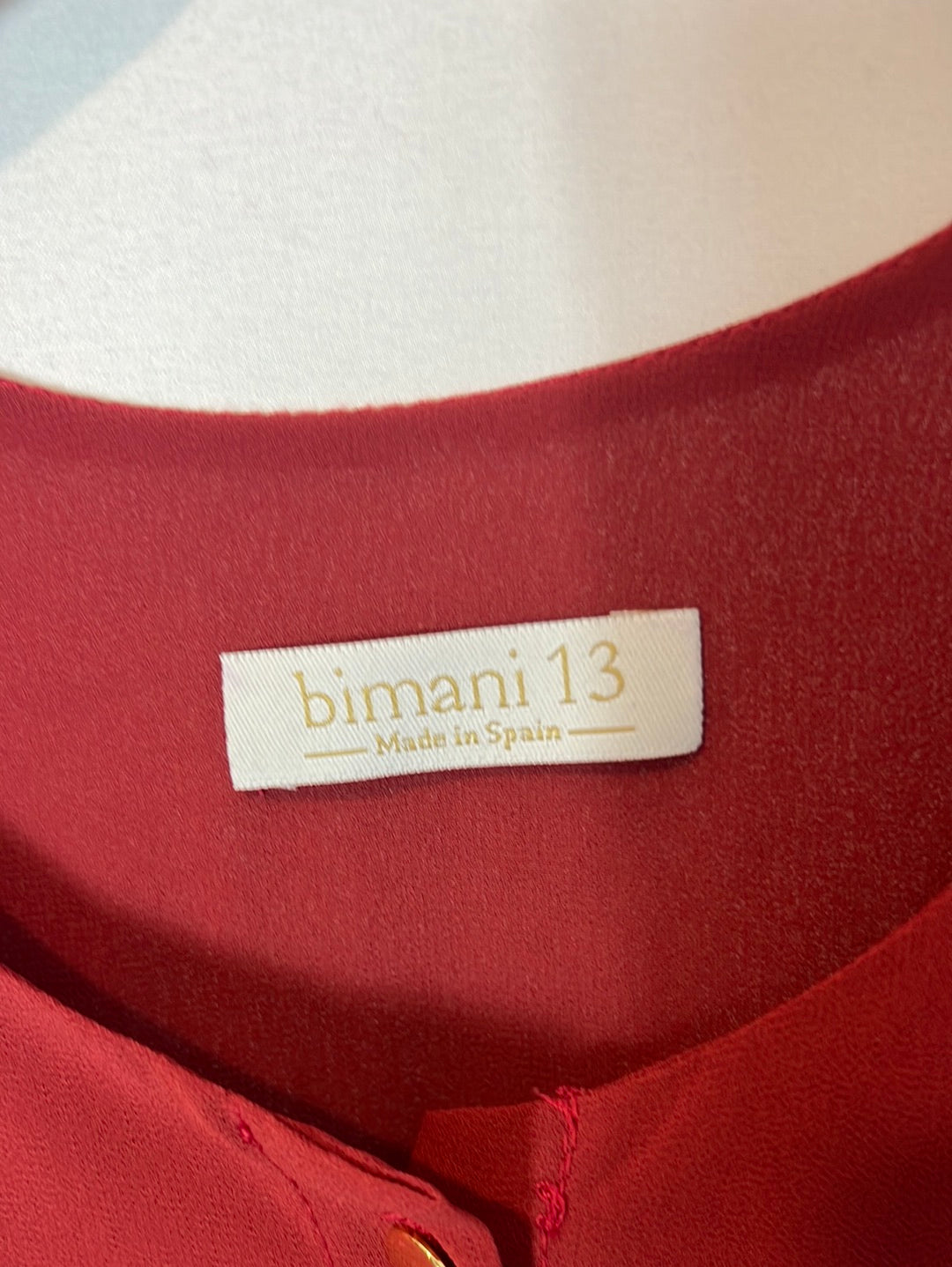 BIMANI. Blusa granate botones dorados. T S